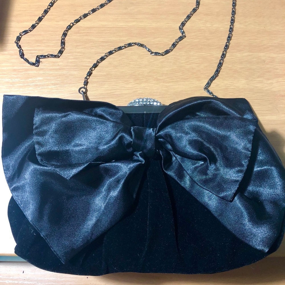 Neiman Marcus black velvet clutch with satin bow